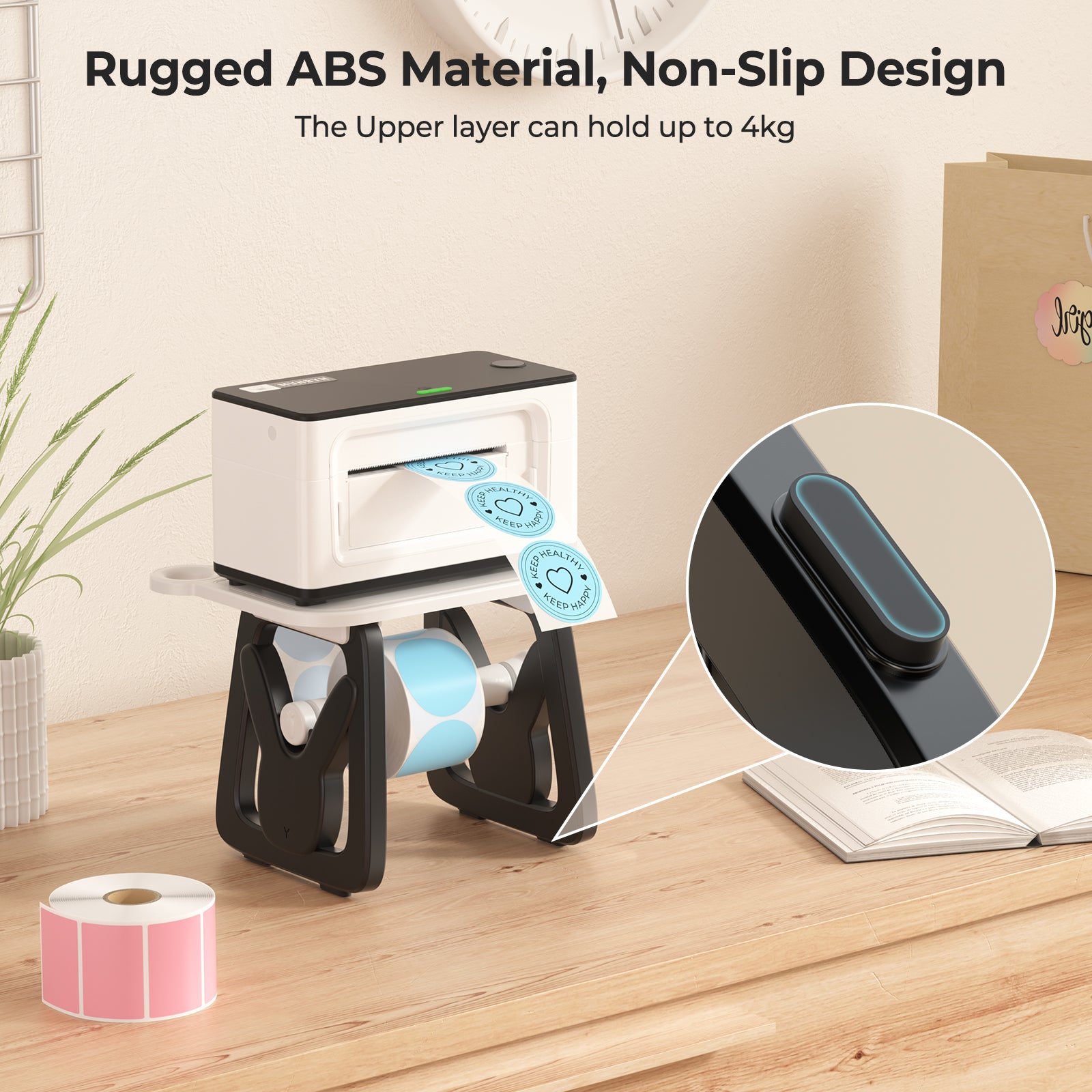 Thermal label printer with non-slip design printing blue round stickers on a wooden desk
