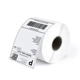 Roll of thermal shipping labels with printed barcode and address, used for package labeling