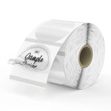 Roll of clear round thermal labels with sample design text, ideal for shipping and packaging