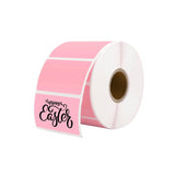 Pink thermal label roll with 'Happy Easter' text, used for shipping and packaging