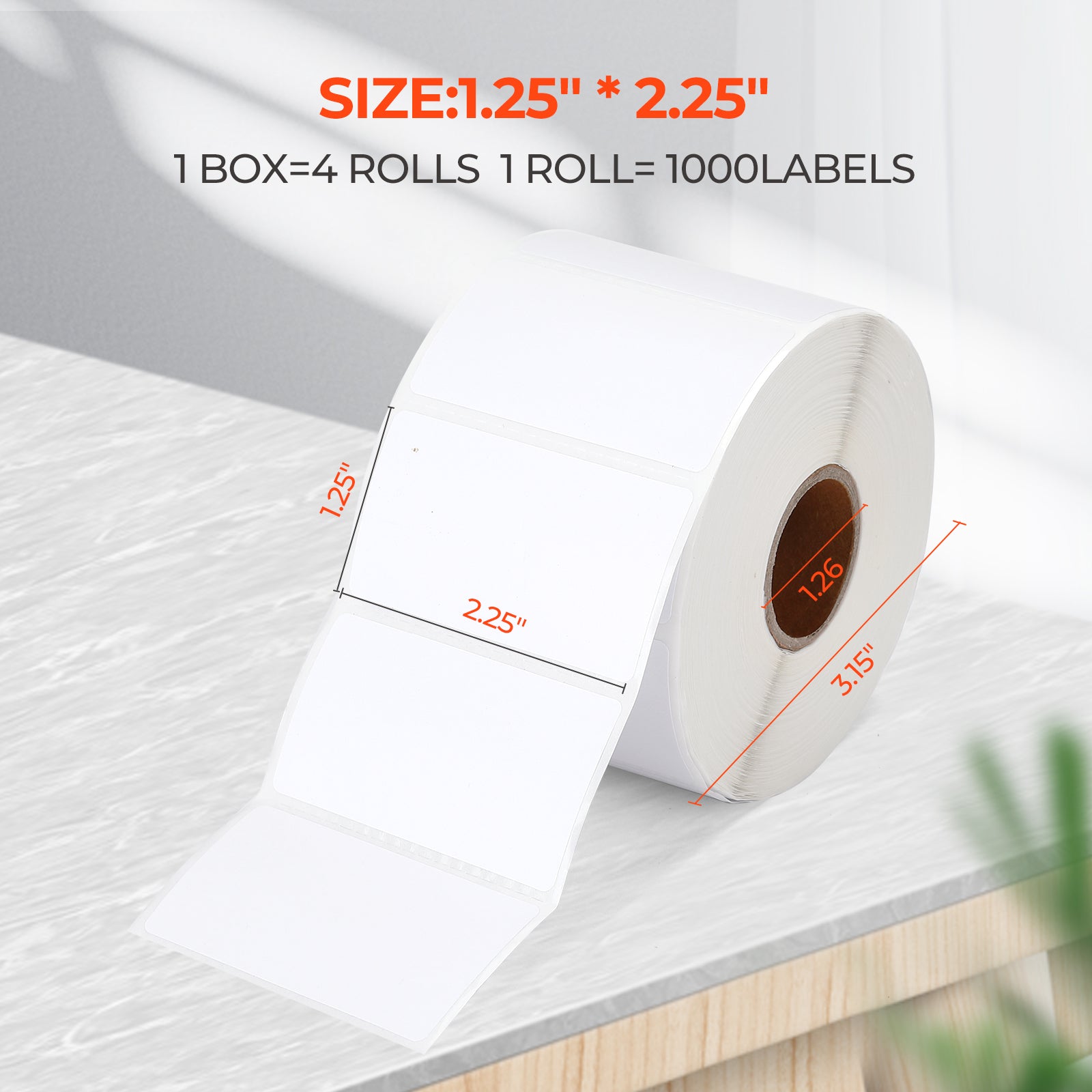 Thermal label roll, 1.25 x 2.25 inch, white blank shipping labels on a desk