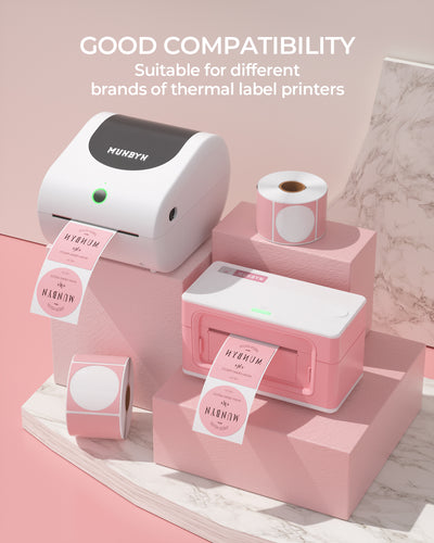 Pink and white thermal label printers with label rolls on pastel blocks, thermal labels printing.