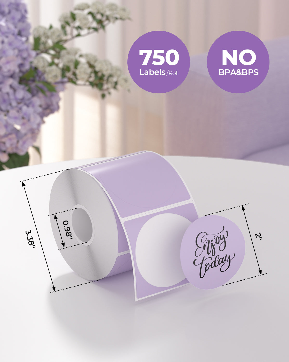 Roll of 2x2 inch round thermal labels, 750 per roll, BPA and BPS free, on a table.