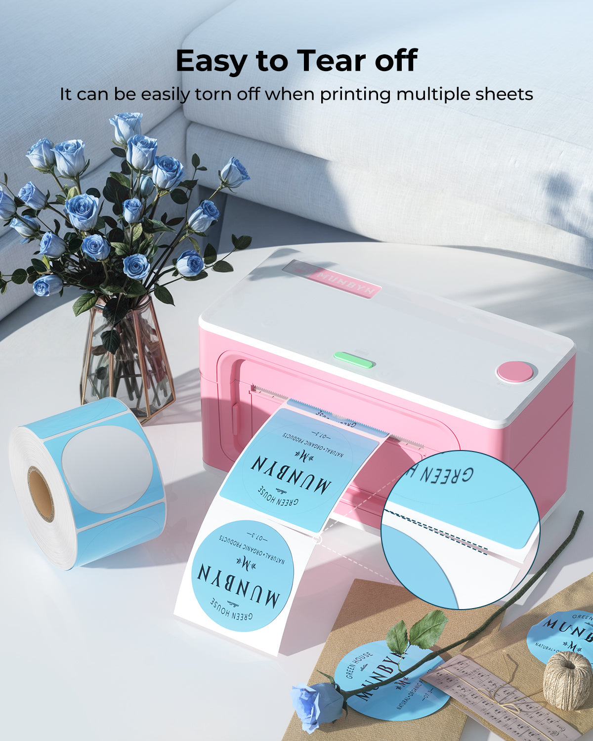 Thermal label printer with blue 2x2 round labels, easy tear-off feature, floral decor
