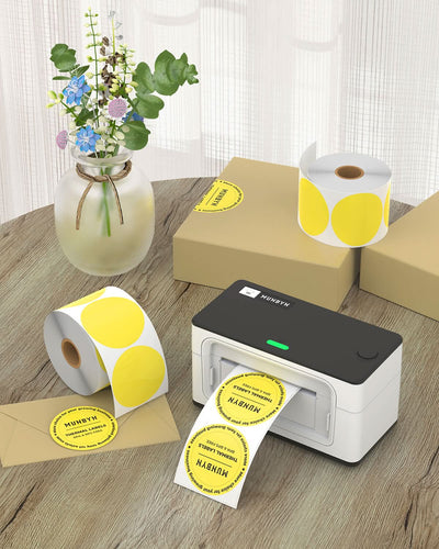 Two 2-inch round labels printed on white label paper from MUNBYN label printer, showing clear circular design on a plain background.