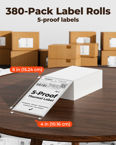 Thermal shipping label, 4x6 inch 5-proof blank labels on a table, packing boxes in background