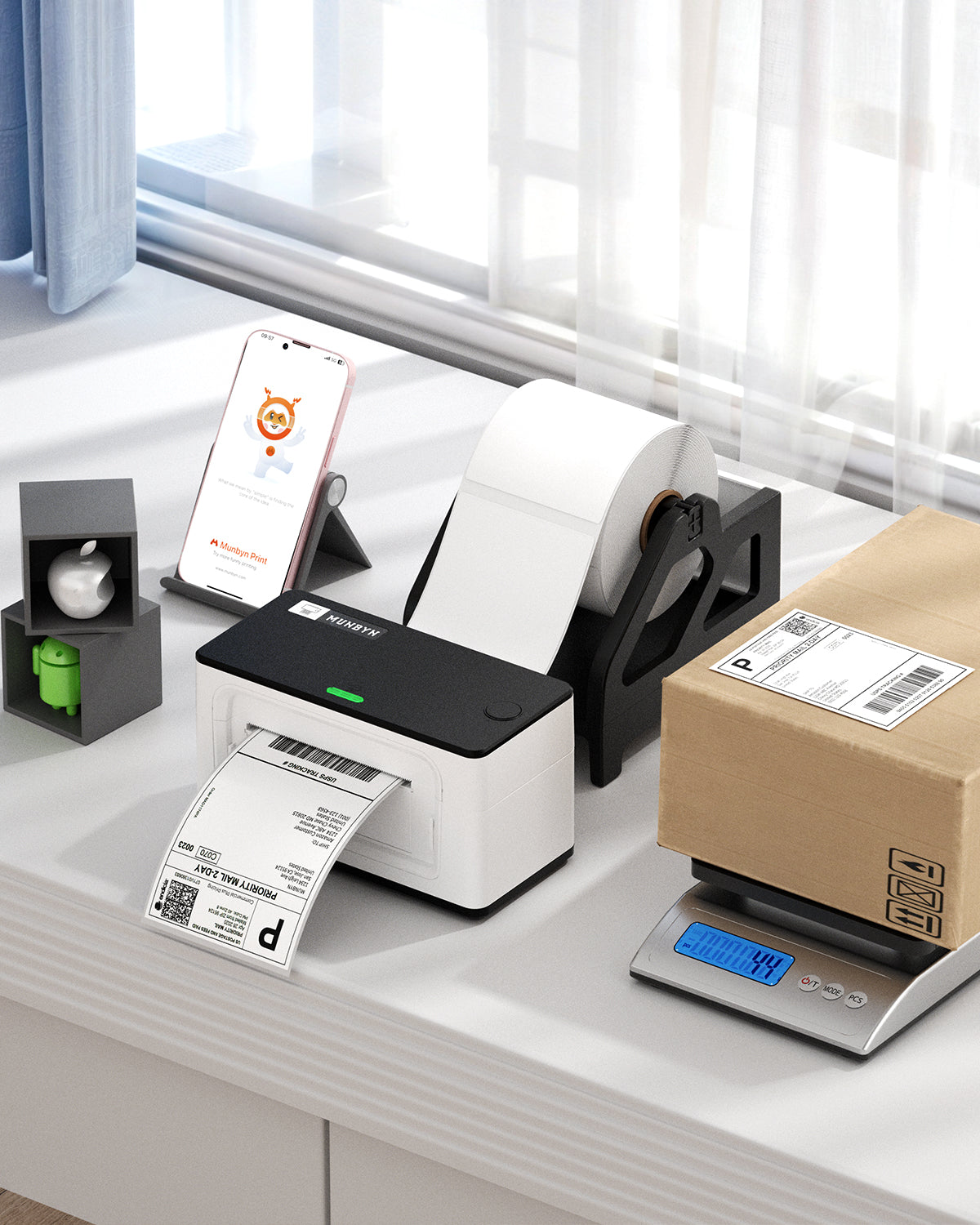 4x6 thermal label roll with label printer, shipping box, and digital scale on desk