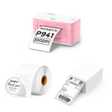 Pink thermal label printer with printed shipping labels and blank label rolls