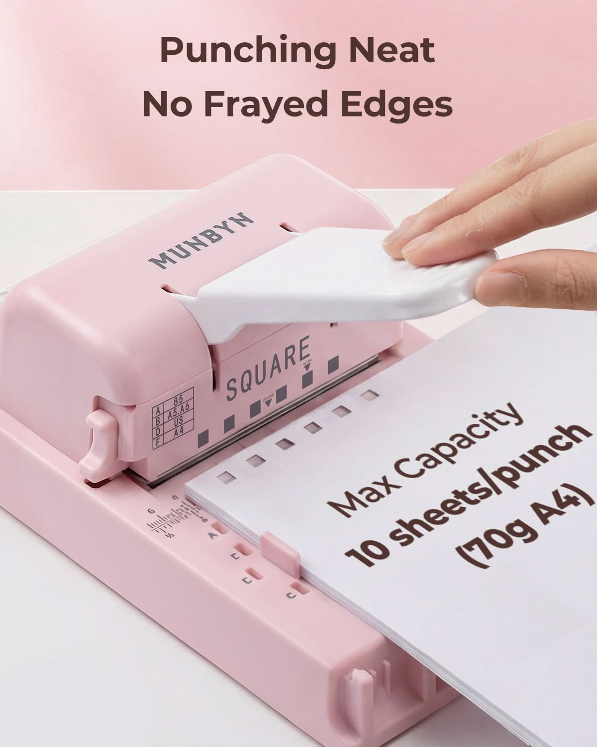 MUNBYN FB001 multi binding machine with black and pink design, showing the device with binding combs and control panel.