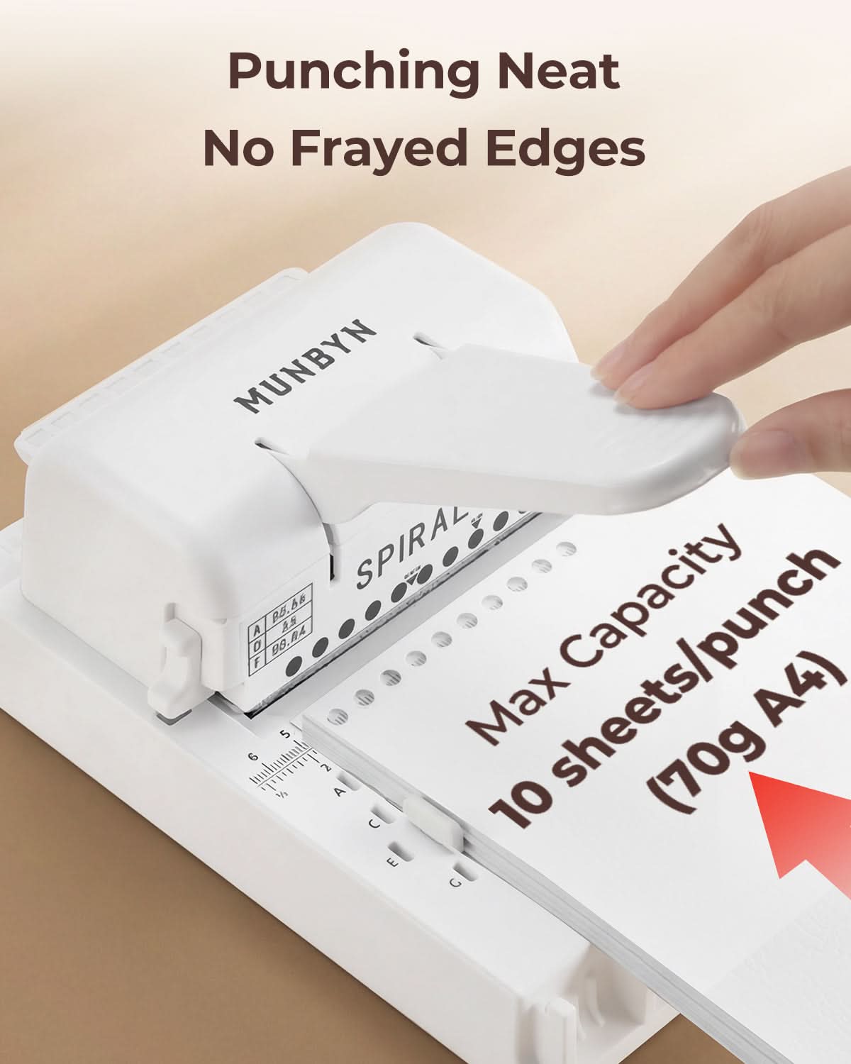 White MUNBYN FB001 multi binding machine with binding combs and paper clips ready for binding documents.