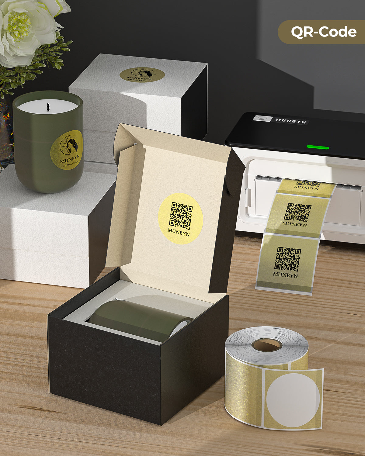 Gold glitter thermal labels with QR codes on a printer, gift box, candle, and packaging.