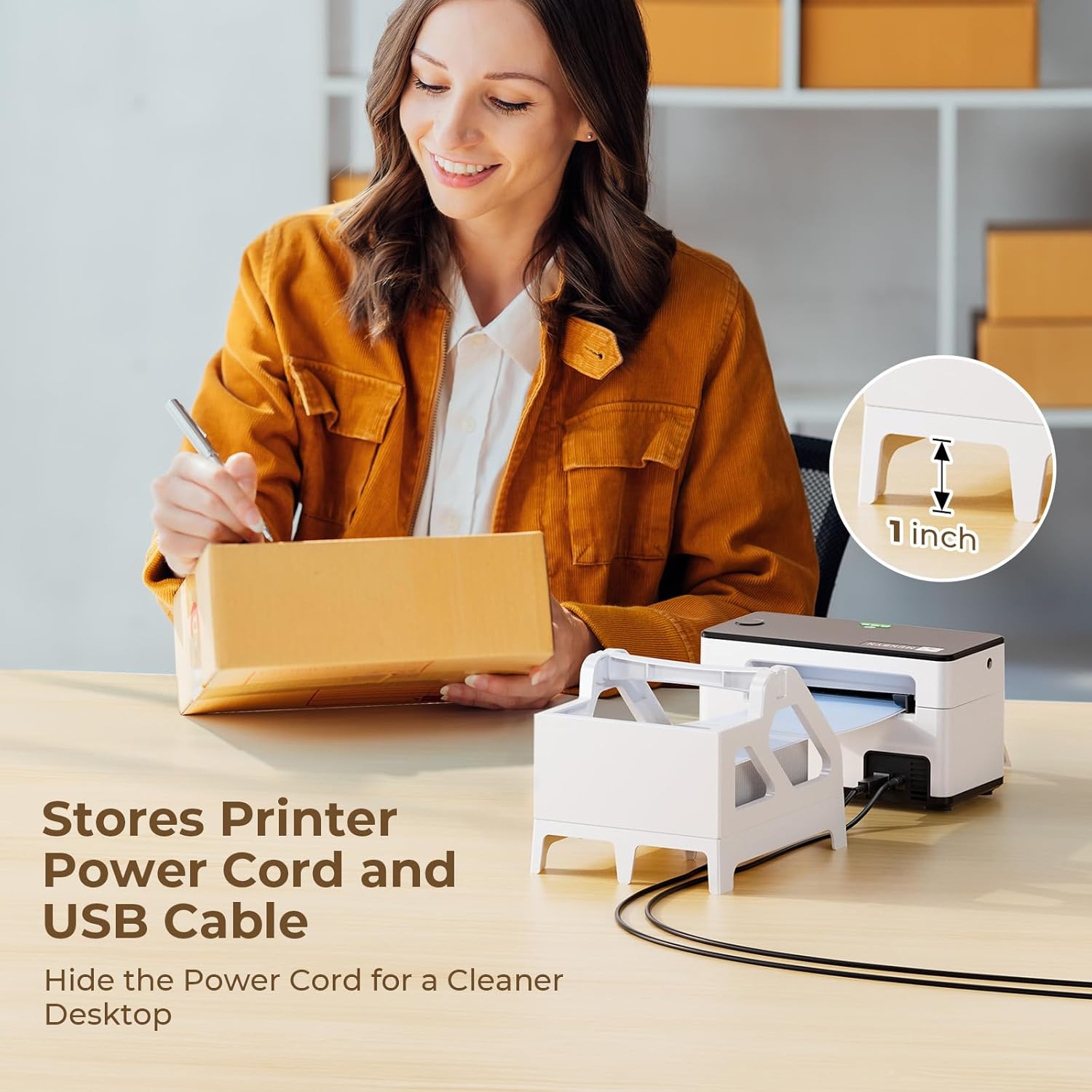 Woman labeling a shipping box with a thermal printer and cable organizer on desk for clean workspace