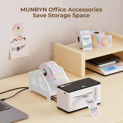 Thermal label printer with holographic circle labels and office accessories on desk