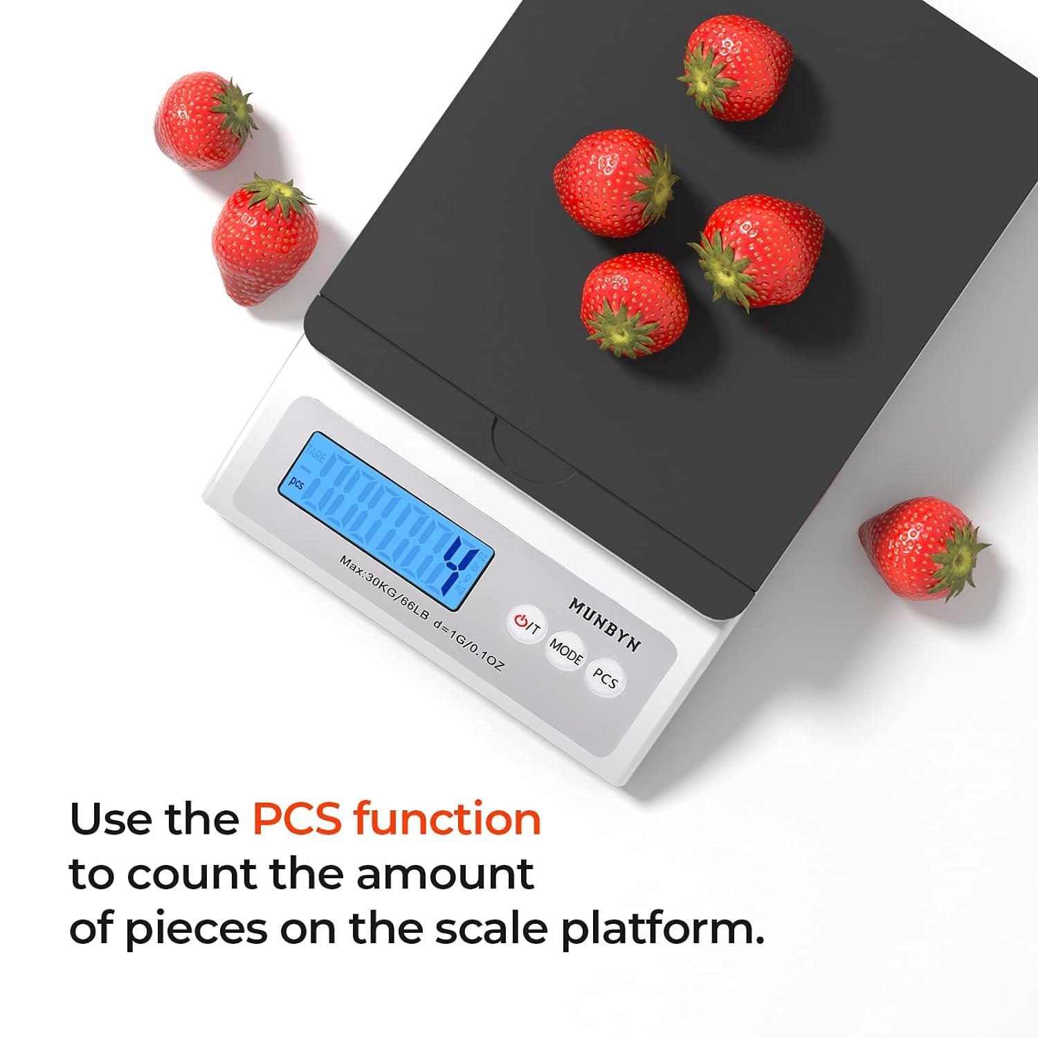 Digital counting scale with strawberries on platform, LCD display showing PCS function