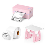 Pink thermal label printer printing shipping label, label roll, and label holder on white background