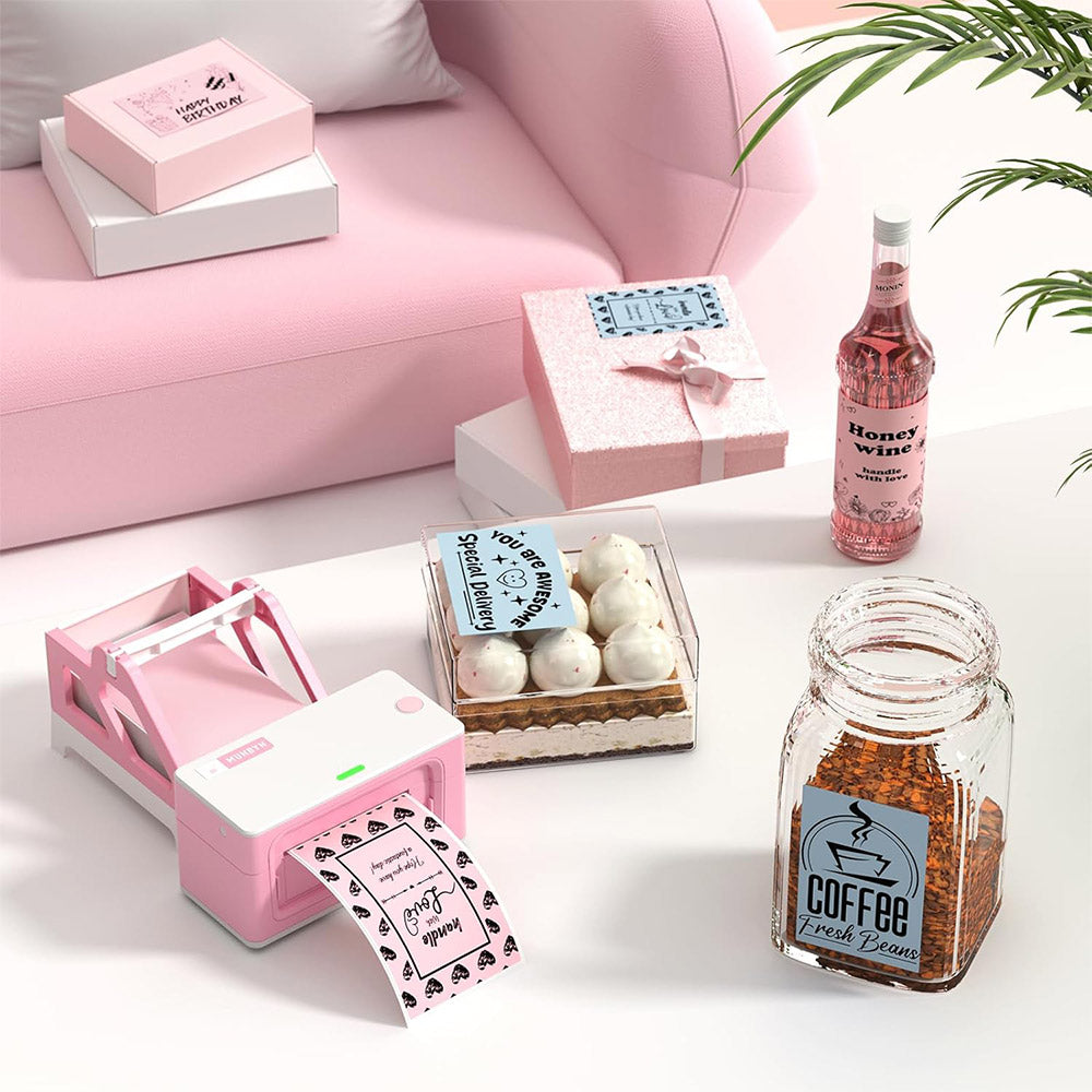 Pink thermal label printer on a table with labeled gifts, coffee jar, desserts, and wine bottle