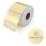 Gold round thermal label stickers roll with 'Sofia and Cleo' logo for packaging