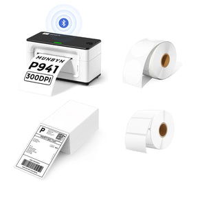 The MUNBYN 941B white Bluetooth label printer kit comes with a printer, two rolls of blank labels, and a stack of shipping labels