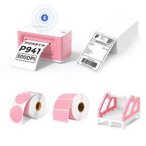 The MUNBYN 941B pink Bluetooth label printer kit includes a printer, a label roll holder, two rolls of pink labels, and a stack of shipping labels