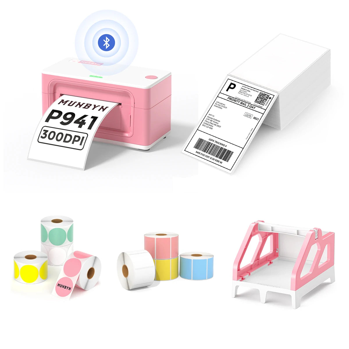 The MUNBYN 941B pink Bluetooth label printer kit includes a printer, a label roll holder, eight rolls of coloured labels, and a stack of shipping labels