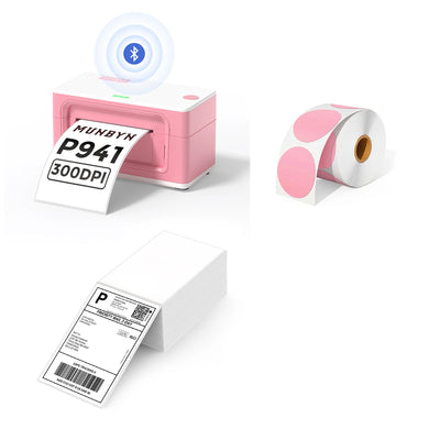 The MUNBYN 941B pink Bluetooth label printer kit includes a printer, a rolls of pink circle labels, and a stack of shipping labels