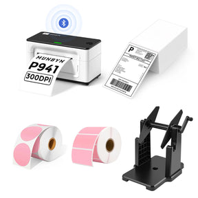 The MUNBYN 941B white Bluetooth label printer kit comes with a printer, a label holder, two rolls of pink labels, and a stack of shipping labels