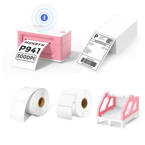 The MUNBYN 941B pink Bluetooth label printer kit includes a printer, a label roll holder, two rolls of blank labels, and a stack of shipping labels.